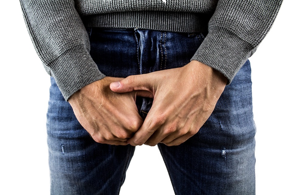 Man holding his manhood